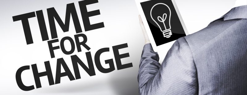 Business man with the text Time for Change